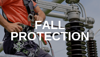 Man clipping a harness with Fall Protection written on top.