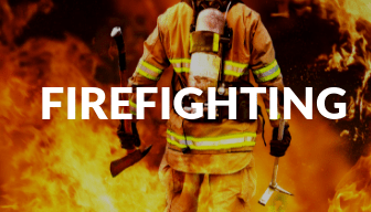 Fire fighter walking towards a fire with Firefighting written on top