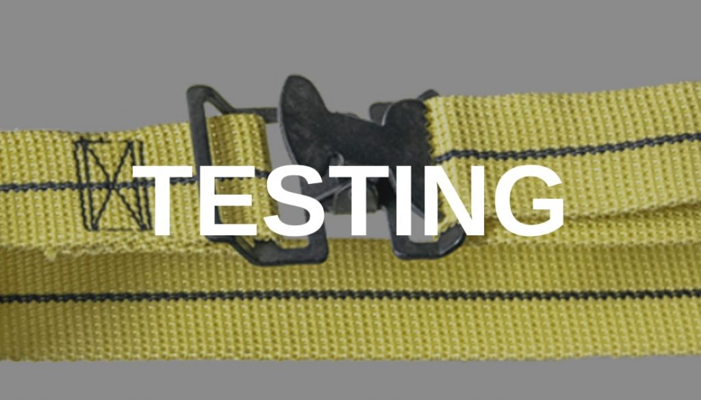 Machine testing strap with Testing written on top
